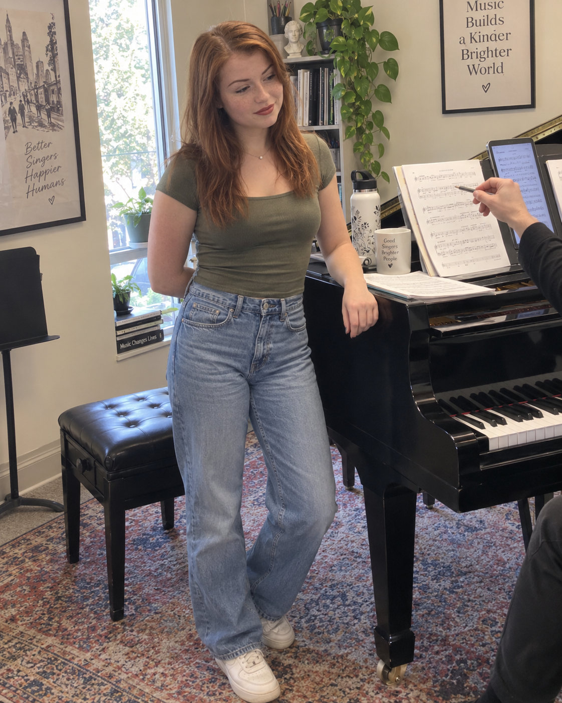 A student working with a score at the piano